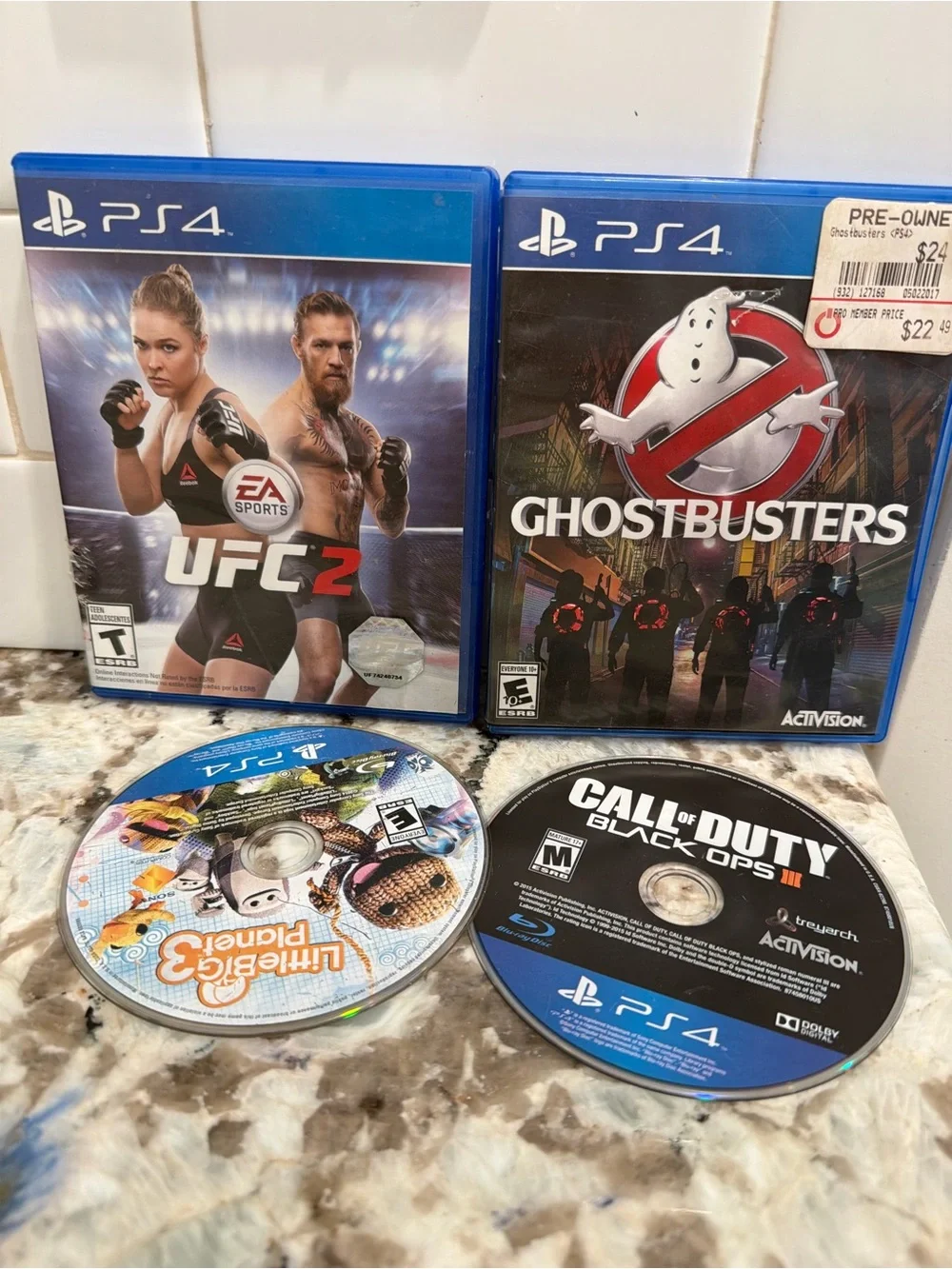 Sony PS4 Game Lot – Blue Cases with Mixed Discs